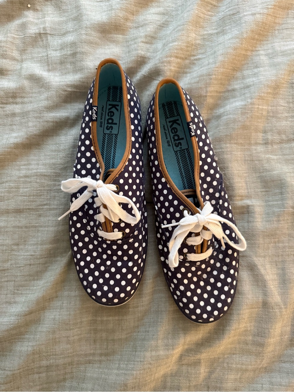 Keds Navy Polka Dot Canvas Sneakers with White Laces and Tan Trim